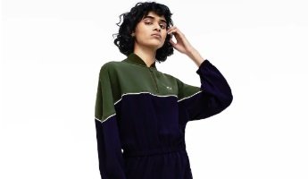 the women's tennis suit is green and purple