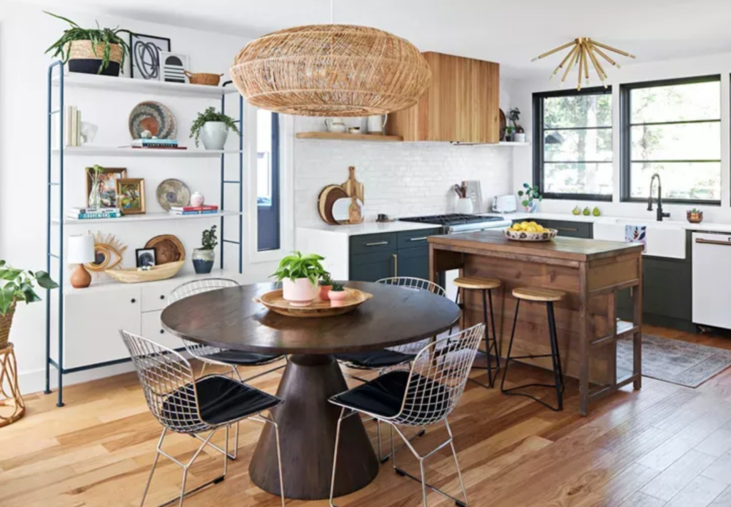 a kitchen with wooden floors and a table